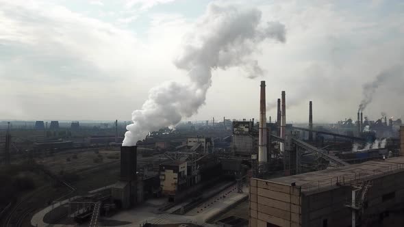 metallurgical plant production industry aerial view chimney smoke from from factorium.