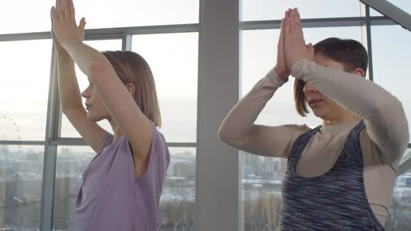 Two Women Doing Balance Asana