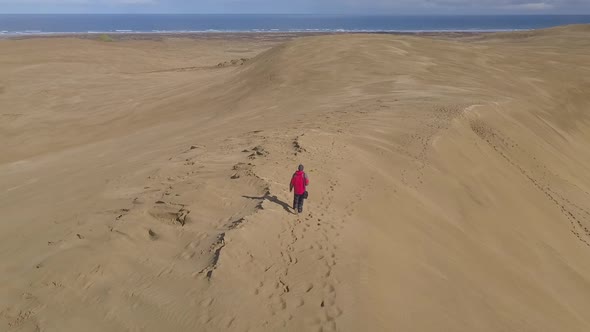 Walking on Giant sand dunes in New Zealand