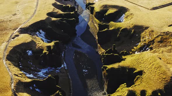 Drone Over Fjaora River And Sunlit Fjaorargljufur Canyon