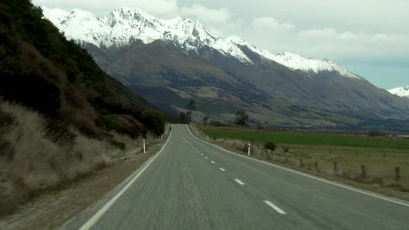 A first person view of driving through the beautiful country of New Zealand