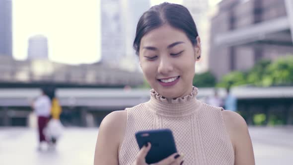 Pretty Woman Using Smartphone