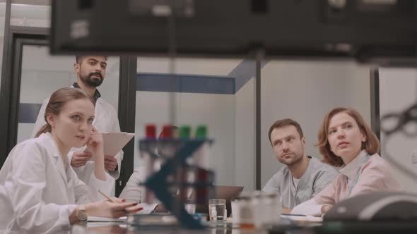 Medical Team Conferencing at Table