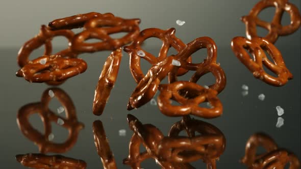 Pretzels falling and bouncing in ultra slow mo 1500fps - reflective surface - PRETZELS PHANTOM 