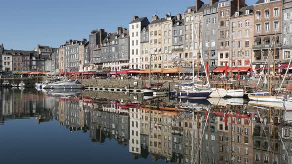 HONFLEUR, FRANCE - SEPTEMBER 2016 Northern  Normandy The Vieux Bassin port  by the day with colorful