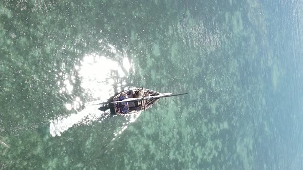 Vertical Video Boats in the Ocean Near the Coast of Zanzibar Tanzania Aerial View