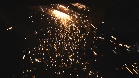 Many Bright Sparks Fly From Hot Metal During Plasma Cutting