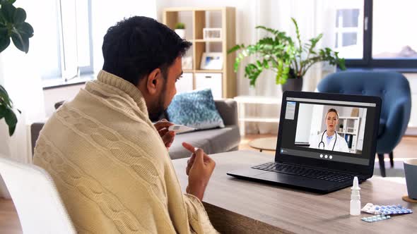 Sick Man Thermometer Having Video Call on Laptop