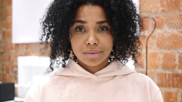 Thinking AfroAmerican Woman Gesturing Brainstorming Indoor