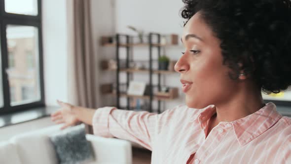 Happy Woman Having Video Call and Showing Her Home