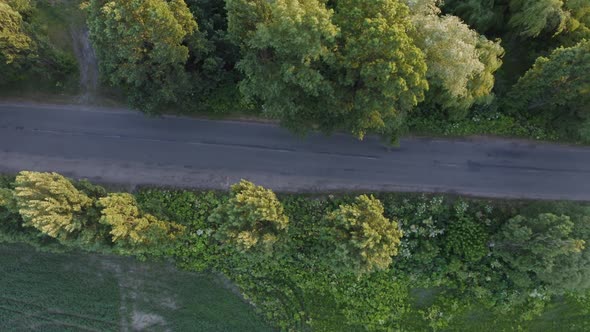 Aerial View Road Near Field At Sunset