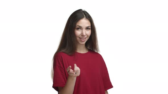 Attractive Sensual Woman with Long Dark Hair Wearing Red Tshirt Asking Come Closer Luring you to