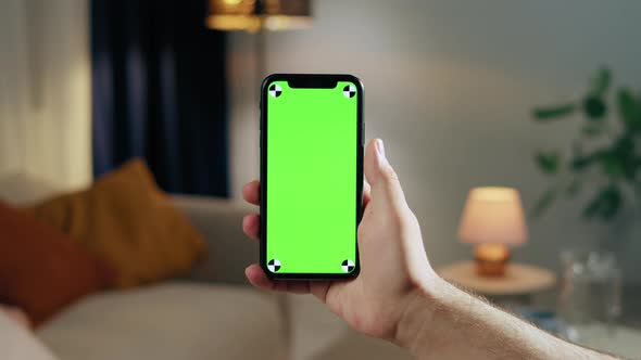 Man Using Smartphone with Chroma Key Closeup