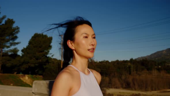 Attractive asian woman going for her morning run