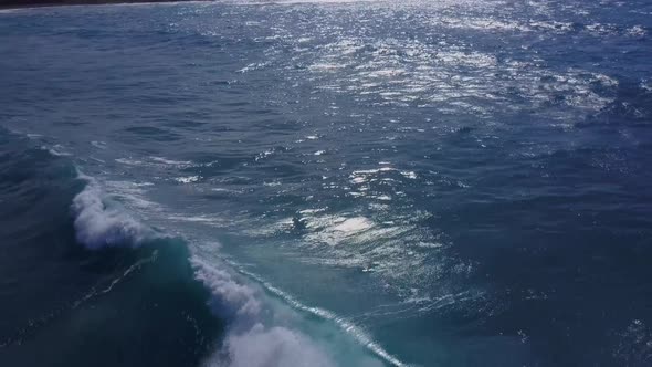 Flying Over The Rugged Coastline Of Hawaii