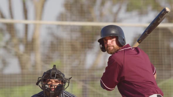 Baseball player hitting a ball during a match