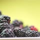 Ripe blackberries on yellow background - VideoHive Item for Sale