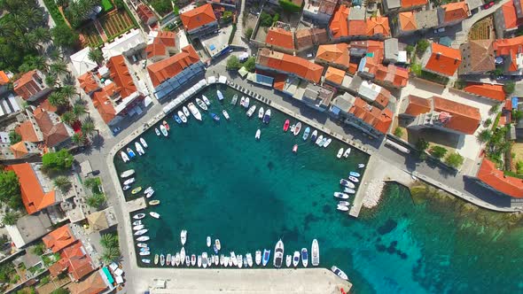 Aerial view of small harbour in the Adriatic alt