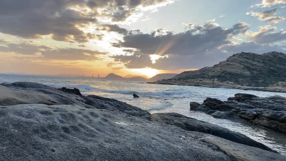 Static peaceful 4K clip of the sun setting above Mediterranean sea in the east of Spain.