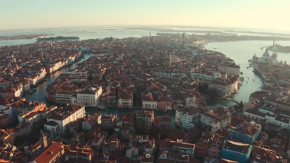 Circling drone shot of central Venice at sunrise