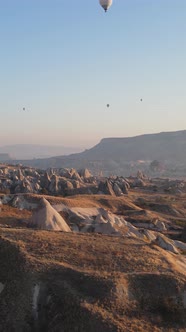 Vertical Video of Hot Air Balloons Flying in the Sky Over Cappadocia Turkey