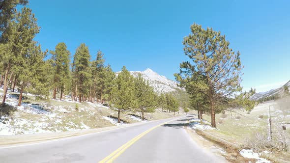 POV point of view -Driving through Rocky Mountain National Park in the Spring.