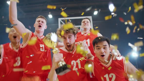 Slow Motion the Red Team of Basketball Players Grejoices at the Victory in the International