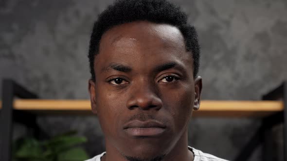 Close Up Serious Face African American Man Looking Camera Standing in Office