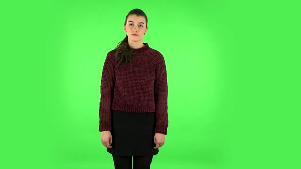 Upset Girl Shrugs and Shakes Her Head Negatively. Green Screen