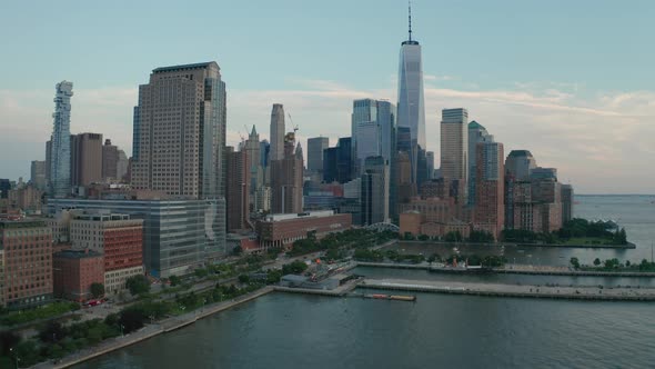 Aerial Drone Shot Ascending Towards Downtown a Dense Cityscape (Manhattan, New York)