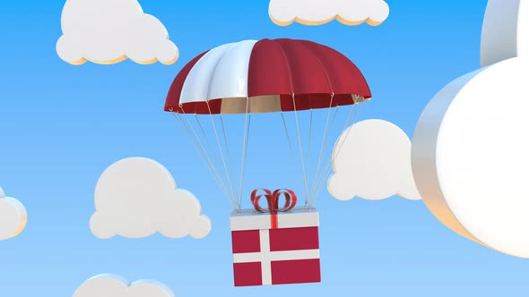 Box with National Flag of Denmark Falls with a Parachute