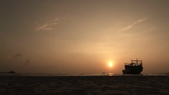 Clouds are Moving and the Sun Goes Down at the Beach in Thailand Sunset