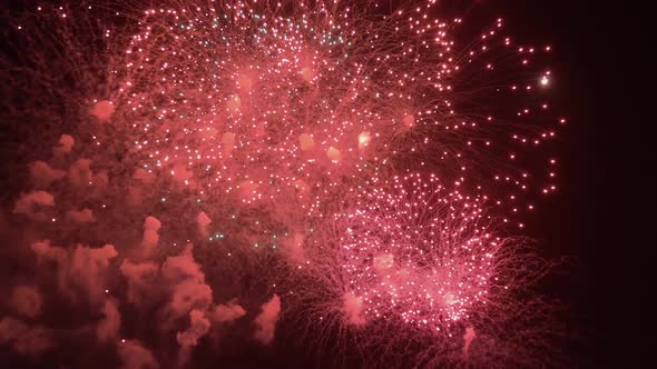 Colorful firework flashes at night