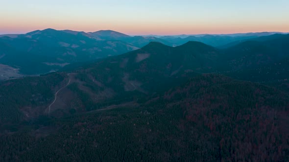 Aerial Hyperlapse over Dzembronya village at sunset