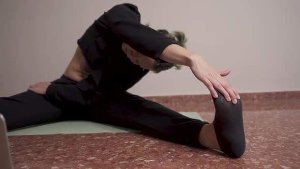 Woman's leg on the floor of the dining room at home