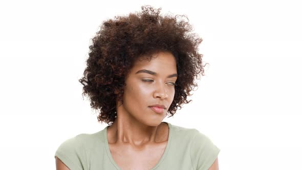 Displeased Young Beautiful African Girl Over White Background