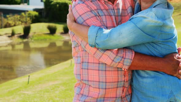 Senior couple hugging each other