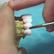 Dental Technician Applying Ceramics Glaze To a Cast Made with CNC Dental Machine - VideoHive Item for Sale