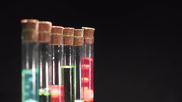 Glass Test Tubes with Boiling Multicolored Liquid
