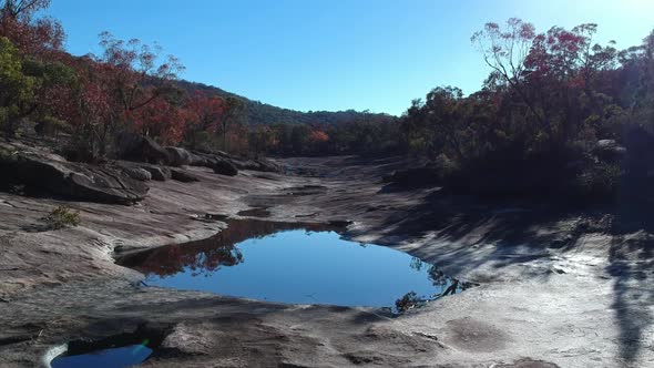 Natural dry creek bed in Australian bush land