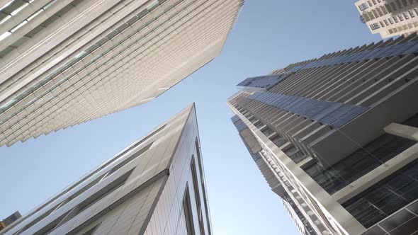 Modern office high rise skyscraper buildings in Sydney city CBD business district. Looking up low an