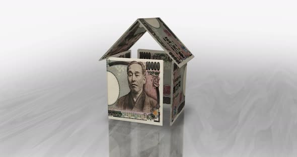 Japan Yen 10000 JPY money banknotes paper house on the table
