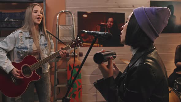 Girl Music Band Singing In Studio