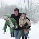 Father carrying son and daughter in snow - VideoHive Item for Sale