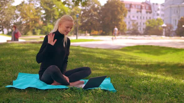 Blonde Girl Has Video Call Outdoors