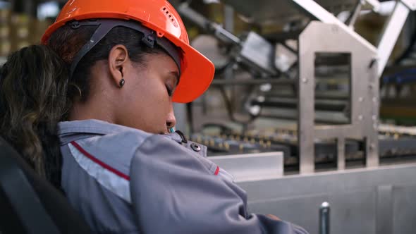 Close-up of a production worker who sleeps at the workplace