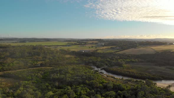 Aerial shot of the morning sunlight on screw creek on the Victorian coastline in Australia.