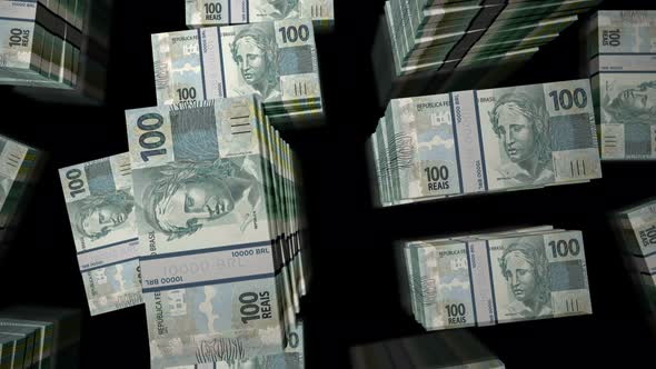 Flight over the Brazilian Real money banknote packs loop
