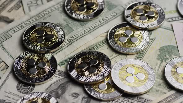 Rotating shot of Bitcoins (digital cryptocurrency) - BITCOIN RIPPLE 