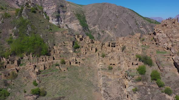 Ghost Town Abandoned in the Mountains the Village of Gamsutl in Summer Day